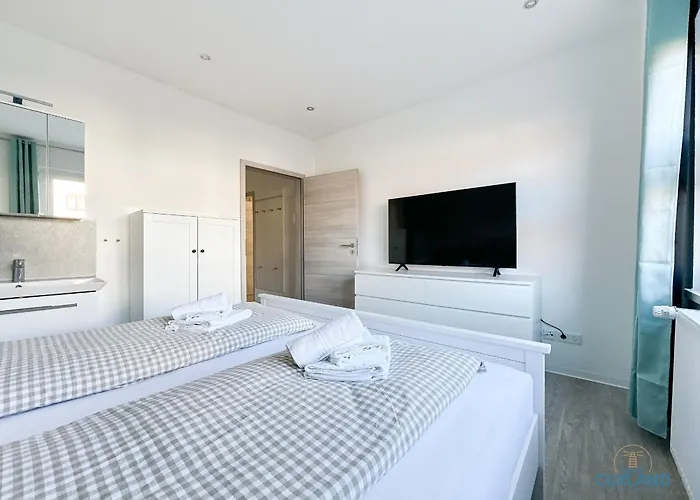 Апартаменты Am Kurpark Куксхафен